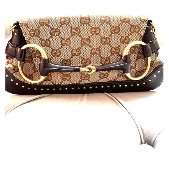 Gucci Handbags - Gucci clutch.  Small shoulder bag